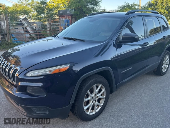 2016 Jeep Cherokee Altitude with VIN 1C4PJLAS7GW208431, listed as a Copart auction lot 61501525 with 126,107 mi miles and Salvage title. Bid and sale history available at DreamBid. Image 2.