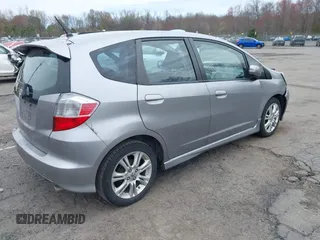 2009 Honda Fit Sport with VIN JHMGE88429S059170, listed as a IAAI auction lot 42091260 with 135,822 mi miles. Bid and sale history available at carsss.com. Image 4.