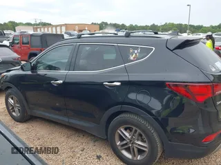 2017 Hyundai Santa Fe 2.4L z VIN 5NMZU3LB5HH029046, wystawiony jako IAAI lot #42212445 z przebiegiem 135 587 mil mil oraz . Historia ofert i sprzedaży dostępna na DreamBid. Obrazek 14.