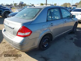 2009 Nissan Versa 1.8 S with VIN 3N1BC11E29L398542, listed as a IAAI auction lot 41689382 with 96,964 mi miles. Bid and sale history available at carsss.com. Image 4.