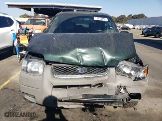 2002 Ford Escape Limited with VIN 1FMCU04162KA51672, listed as a Copart auction lot 74035414 with 140,752 mi miles and Salvage Title. Bid and sale history available at carsss.com. Image 5.