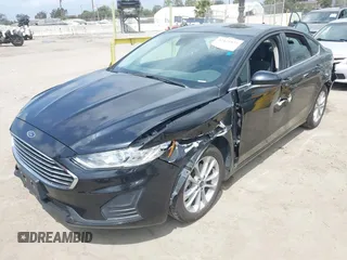 2020 Ford Fusion SE z VIN 3FA6P0LU7LR170922, wystawiony jako IAAI lot #42121025 z przebiegiem 115 799 mil mil oraz . Historia ofert i sprzedaży dostępna na DreamBid. Obrazek 17.