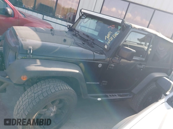 2011 Jeep Wrangler Rubicon with VIN 1J4BA6D10BL628180, listed as a IAAI auction lot 41711065 with 155,940 mi miles and . Bid and sale history available at carsss.com. Image 14.