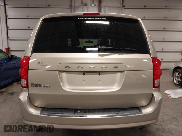 2013 Dodge Grand Caravan SXT with VIN 2C4RDGCG0DR567186, listed as a IAAI auction lot 41706119 with 112,512 mi miles and . Bid and sale history available at DreamBid. Image 17.