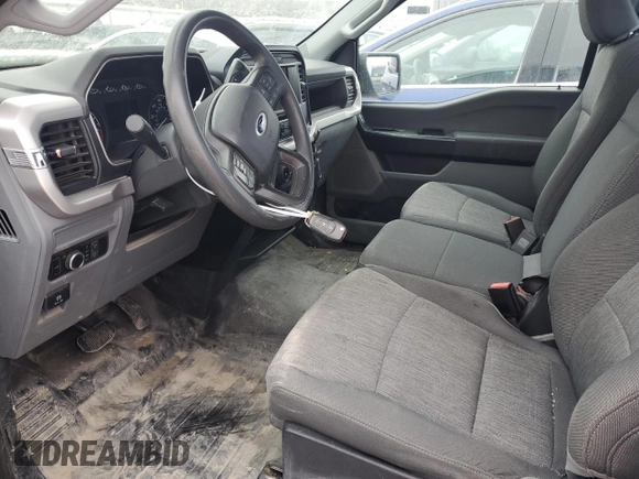 2023 Ford F-150 XL with VIN 1FTMF1CBXPKE33584, listed as a Copart auction lot 42448195 with 51,318 mi miles and Salvage title. Bid and sale history available at DreamBid. Image 7.