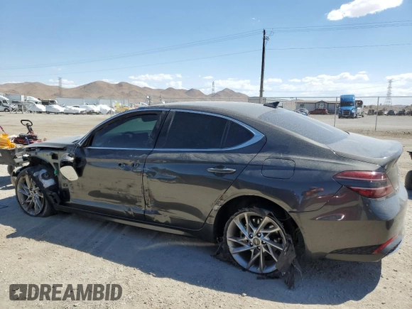 2022 Genesis G70 2.0T with VIN KMTG34TA3NU099562, listed as a Copart auction lot 69646954 with 50,334 mi miles and Salvage Title. Bid and sale history available at carsss.com. Image 2.