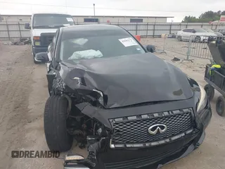 2015 Infiniti Q50 Premium with VIN JN1BV7AR6FM420057, listed as a IAAI auction lot 42045172 with 119,443 mi miles. Bid and sale history available at carsss.com. Image 1.