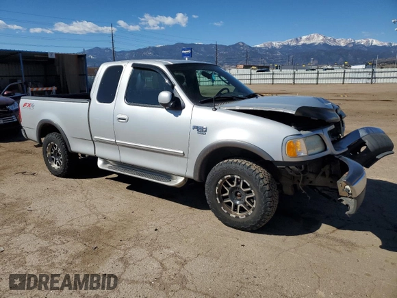 2003 Ford F-150 XL with VIN 2FTRX18L43CA34088, listed as a Copart auction lot 50604455 with 113,761 mi miles and Salvage Title. Bid and sale history available at carsss.com. Image 4.