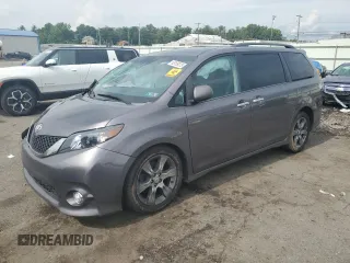 2014 Toyota Sienna SE with VIN 5TDXK3DC4ES517658, listed as a Copart auction lot 65159275 with Not provided miles and Salvage title. Bid and sale history available at DreamBid. Image 1.