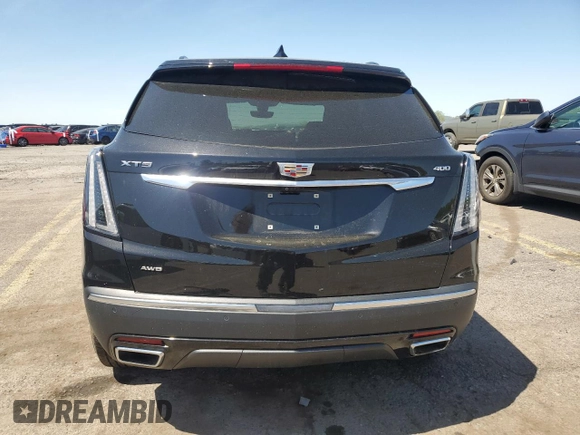 2023 Cadillac XT5 AWD Sport with VIN 1GYKNGRS8PZ100581, listed as a Copart auction lot 55157035 with 14,637 mi miles and Salvage title. Bid and sale history available at DreamBid. Image 6.