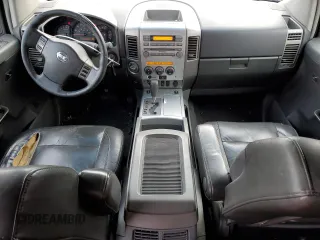 2006 Nissan Titan LE z VIN 1N6BA07B16N527650, wystawiony jako Copart lot #48126105 z przebiegiem 289 954 mil mil oraz Szkoda całkowita • Salvage title. Historia ofert i sprzedaży dostępna na DreamBid. Obrazek 8.