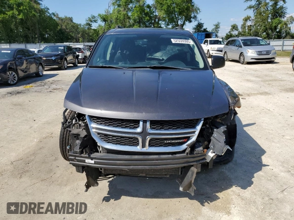 2017 Dodge Journey SE with VIN 3C4PDCAB6HT621987, listed as a Copart auction lot 52559305 with 169,468 mi miles and Salvage Title. Bid and sale history available at DreamBid. Image 5.