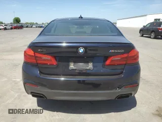 2019 BMW 5 Series M550i xDrive with VIN WBAJB9C5XKB287877, listed as a Copart auction lot 52994065 with 52,460 mi miles and Salvage title. Bid and sale history available at DreamBid. Image 6.