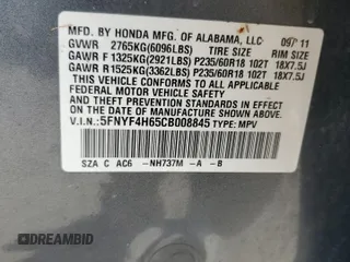 2012 Honda Pilot EX-L z VIN 5FNYF4H65CB008845, wystawiony jako Copart lot #55079475 z przebiegiem 186 457 mil mil oraz Szkoda całkowita • Salvage title. Historia ofert i sprzedaży dostępna na DreamBid. Obrazek 14.