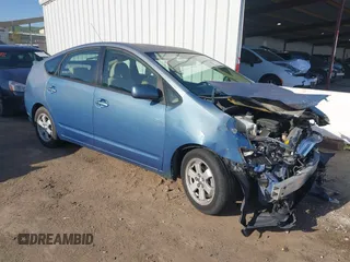 2005 Toyota Prius z VIN JTDKB20U053110246, wystawiony jako IAAI lot #41965829 z przebiegiem 179 441 mil mil oraz . Historia ofert i sprzedaży dostępna na DreamBid. Obrazek 1.