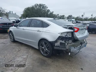 2015 Ford Fusion Titanium with VIN 3FA6P0K94FR120318, listed as a IAAI auction lot 41380325 with 137,910 mi miles. Bid and sale history available at carsss.com. Image 3.
