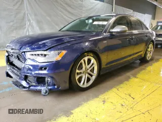 2014 Audi S6 Prestige z VIN WAUF2AFC2EN044116, wystawiony jako Copart lot #56415015 z przebiegiem 112 284 mil mil oraz Tytuł czysty. Historia ofert i sprzedaży dostępna na DreamBid. Obrazek 1.
