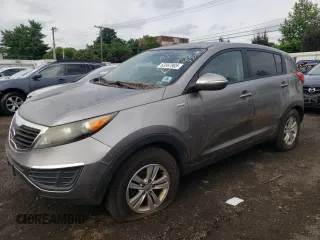 2011 Kia Sportage LX with VIN KNDPBCA23B7049715, listed as a Copart auction lot 63397905 with 195,235 mi miles and Clean title. Bid and sale history available at DreamBid. Image 1.