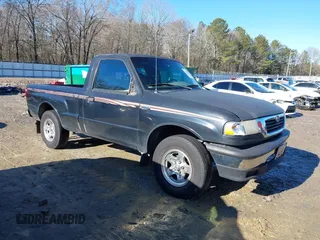 1998 Mazda B-Series 2WD Truck SX with VIN 4F4YR12C4WTM47743, listed as a IAAI auction lot 41430832 with 318,909 mi miles. Bid and sale history available at carsss.com. Image 1.