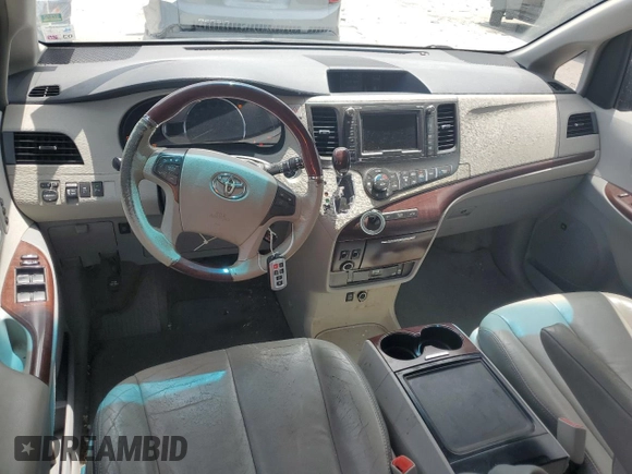 2012 Toyota Sienna XLE AAS с VIN 5TDYK3DC9CS242130, выставлен на аукционе Copart как лот 60423935 с пробегом 175 387 миль миль и Списание • Salvage title. История ставок и продаж доступна на DreamBid. Изображение 8.