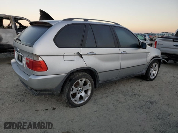 2002 BMW X5 3.0i with VIN 5UXFA535X2LP50341, listed as a Copart auction lot 73180214 with 0 mi miles and Salvage Title. Bid and sale history available at carsss.com. Image 3.