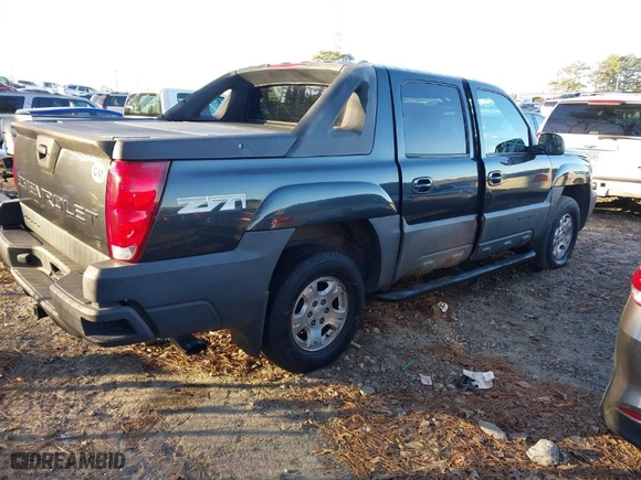 2003 Chevrolet Avalanche with VIN 3GNEK13T53G133517, listed as a IAAI auction lot 41255963 with 244,731 mi miles. Bid and sale history available at carsss.com. Image 4.