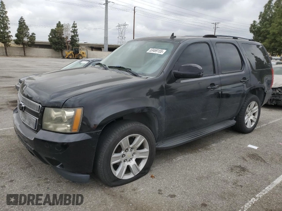 2007 Chevrolet Tahoe LT z VIN 1GNFC13047R276388, wystawiony jako Copart lot #53469155 z przebiegiem Nie podano mil oraz Szkoda całkowita • Salvage title. Historia ofert i sprzedaży dostępna na DreamBid. Obrazek 1.