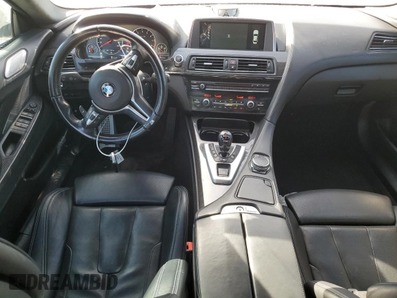 2015 BMW M6 z VIN WBS6C9C58FD467867, wystawiony jako Copart lot #75966844 z przebiegiem 94 102 mil mil oraz Szkoda całkowita • Salvage title. Historia ofert i sprzedaży dostępna na DreamBid. Obrazek 8.