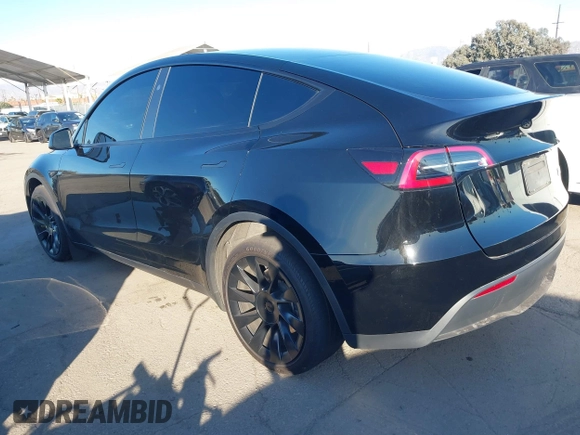 2024 Tesla Model Y Long Range with VIN 7SAYGDEEXRA216186, listed as a IAAI auction lot 41106653 with 25,331 mi miles and . Bid and sale history available at DreamBid. Image 3.