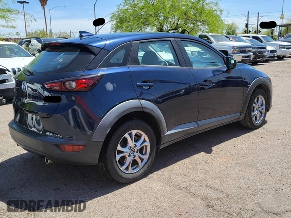 2020 Mazda CX-3 Sport with VIN JM1DKDB76L1465863, listed as a Copart auction lot 55283885 with 180,000 mi miles and Clean Title. Bid and sale history available at carsss.com. Image 4.