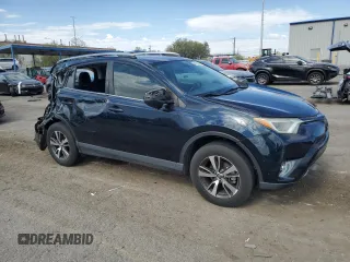 2018 Toyota RAV4 XLE with VIN JTMWFREV7JD130465, listed as a Copart auction lot 63314795 with 97,334 mi miles and Salvage title. Bid and sale history available at DreamBid. Image 4.