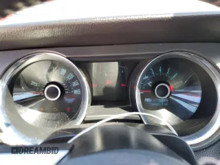 2013 Ford Mustang V6 with VIN 1ZVBP8EM9D5217390, listed as a Copart auction lot 50158865 with 128,928 mi miles and Salvage title. Bid and sale history available at DreamBid. Image 9.