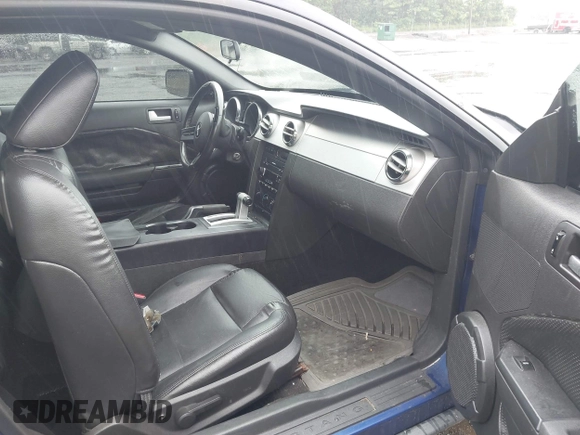 2005 Ford Mustang Deluxe z VIN 1ZVFT80N655234887, wystawiony jako IAAI lot #42521363 z przebiegiem 164 011 mil mil oraz . Historia ofert i sprzedaży dostępna na DreamBid. Obrazek 5.