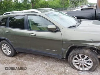 2020 Jeep Cherokee Latitude z VIN 1C4PJMCB5LD636295, wystawiony jako IAAI lot #42358449 z przebiegiem 103 478 mil mil oraz . Historia ofert i sprzedaży dostępna na DreamBid. Obrazek 13.