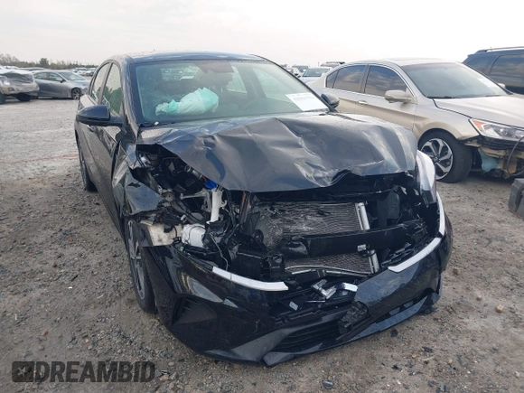2024 Kia Forte LXS z VIN 3KPF24AD7RE799390, wystawiony jako IAAI lot #41856786 z przebiegiem 24 804 mil mil oraz . Historia ofert i sprzedaży dostępna na DreamBid. Obrazek 6.