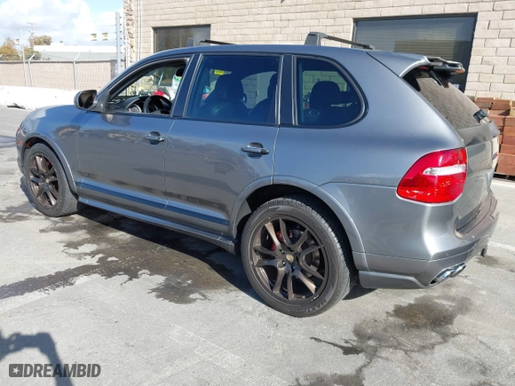 2009 Porsche Cayenne GTS with VIN WP1AD29P49LA61351, listed as a IAAI auction lot 40810730 with 213,628 mi miles. Bid and sale history available at carsss.com. Image 3.