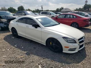2014 Mercedes-Benz CLS-Class CLS 550 with VIN WDDLJ9BB9EA117290, listed as a Copart auction lot 68517414 with 98,705 mi miles and Salvage Title. Bid and sale history available at carsss.com. Image 4.