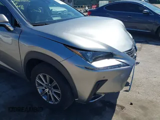 2021 Lexus NX 300 with VIN JTJDARDZ4M2259464, listed as a IAAI auction lot 41984305 with 26,505 mi miles and . Bid and sale history available at DreamBid. Image 18.
