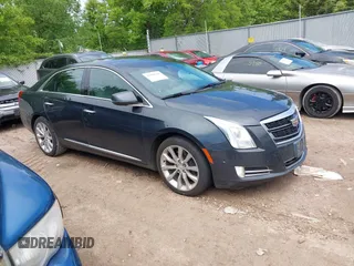 2016 Cadillac XTS Luxury Collection with VIN 2G61M5S37G9100161, listed as a IAAI auction lot 42328247 with 162,718 mi miles and . Bid and sale history available at DreamBid. Image 1.