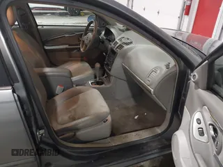 2005 Chevrolet Malibu Maxx LT with VIN 1G1ZU64875F225057, listed as a IAAI auction lot 41290454 with 141,911 mi miles. Bid and sale history available at carsss.com. Image 5.