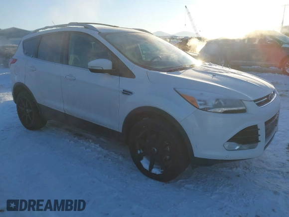 2016 Ford Escape Titanium with VIN 1FMCU9J94GUC81270, listed as a IAAI auction lot 41502724 with 128,161 mi miles. Bid and sale history available at carsss.com. Image 1.