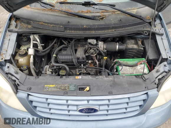 2005 Ford Freestar SE z VIN 2FMDA51605BA50204, wystawiony jako Copart lot #56002955 z przebiegiem 212 942 mil mil oraz Szkody całkowita. Historia ofert i sprzedaży dostępna na DreamBid. Obrazek 12.