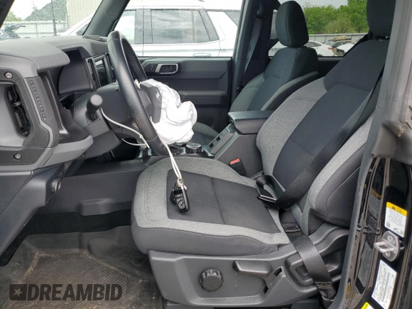2022 Ford Bronco with VIN 1FMDE5BH5NLA89889, listed as a Copart auction lot 56490255 with 21,913 mi miles and Salvage title. Bid and sale history available at DreamBid. Image 7.