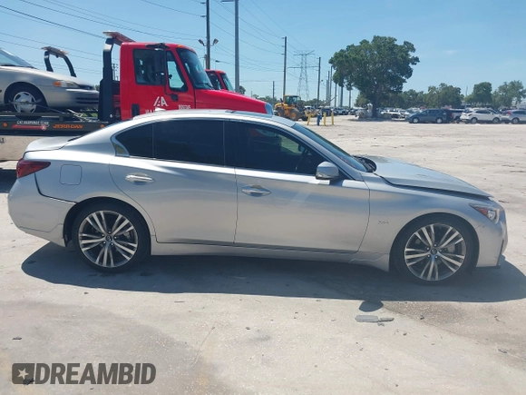 2018 Infiniti Q50 Luxe with VIN JN1EV7AP7JM358611, listed as a IAAI auction lot 42579521 with 102,922 mi miles and . Bid and sale history available at DreamBid. Image 14.