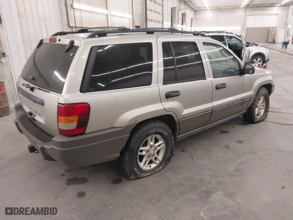 2003 Jeep Grand Cherokee Laredo with VIN 1J4GW48SX3C544237, listed as a IAAI auction lot 40823228 with 1 mi miles. Bid and sale history available at carsss.com. Image 4.