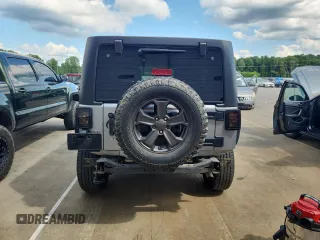 2016 Jeep Wrangler Unlimited Sahara with VIN 1C4BJWEG6GL168944, listed as a Copart auction lot 61650615 with 66,016 mi miles and Salvage title. Bid and sale history available at DreamBid. Image 6.