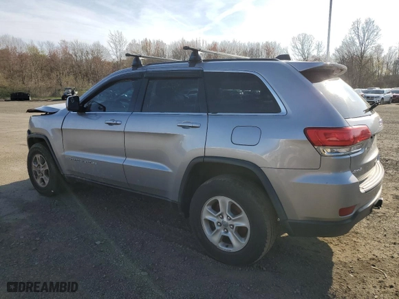 2015 Jeep Grand Cherokee Laredo with VIN 1C4RJFAG4FC675506, listed as a Copart auction lot 54562815 with 112,898 mi miles and Clean Title. Bid and sale history available at carsss.com. Image 2.