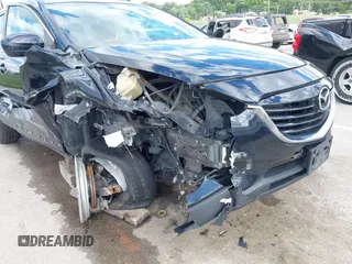 2014 Mazda CX-9 Touring with VIN JM3TB2CA9E0442202, listed as a IAAI auction lot 42292356 with 239,578 mi miles and . Bid and sale history available at DreamBid. Image 6.