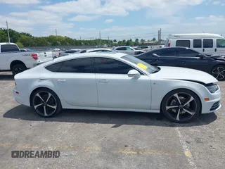 2016 Audi A7 3.0 Prestige with VIN WAU2GAFCXGN102993, listed as a IAAI auction lot 42099259 with 64,490 mi miles. Bid and sale history available at carsss.com. Image 13.