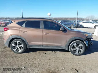 2016 Hyundai Tucson Sport with VIN KM8J33A20GU183234, listed as a IAAI auction lot 41429777 with 113,077 mi miles. Bid and sale history available at carsss.com. Image 14.